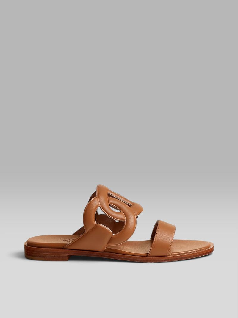 Hermès Amica Leather Flat Sandals - Gold / Tan