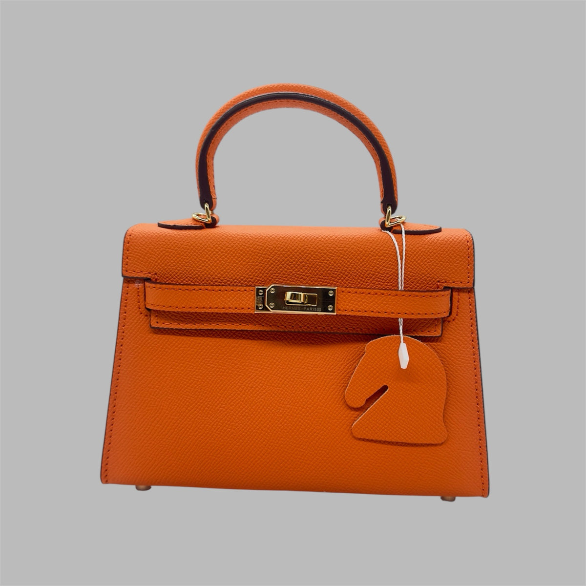 Hermès Kelly 25 retourne handbag strap in Orange Feu Togo leather , GHW