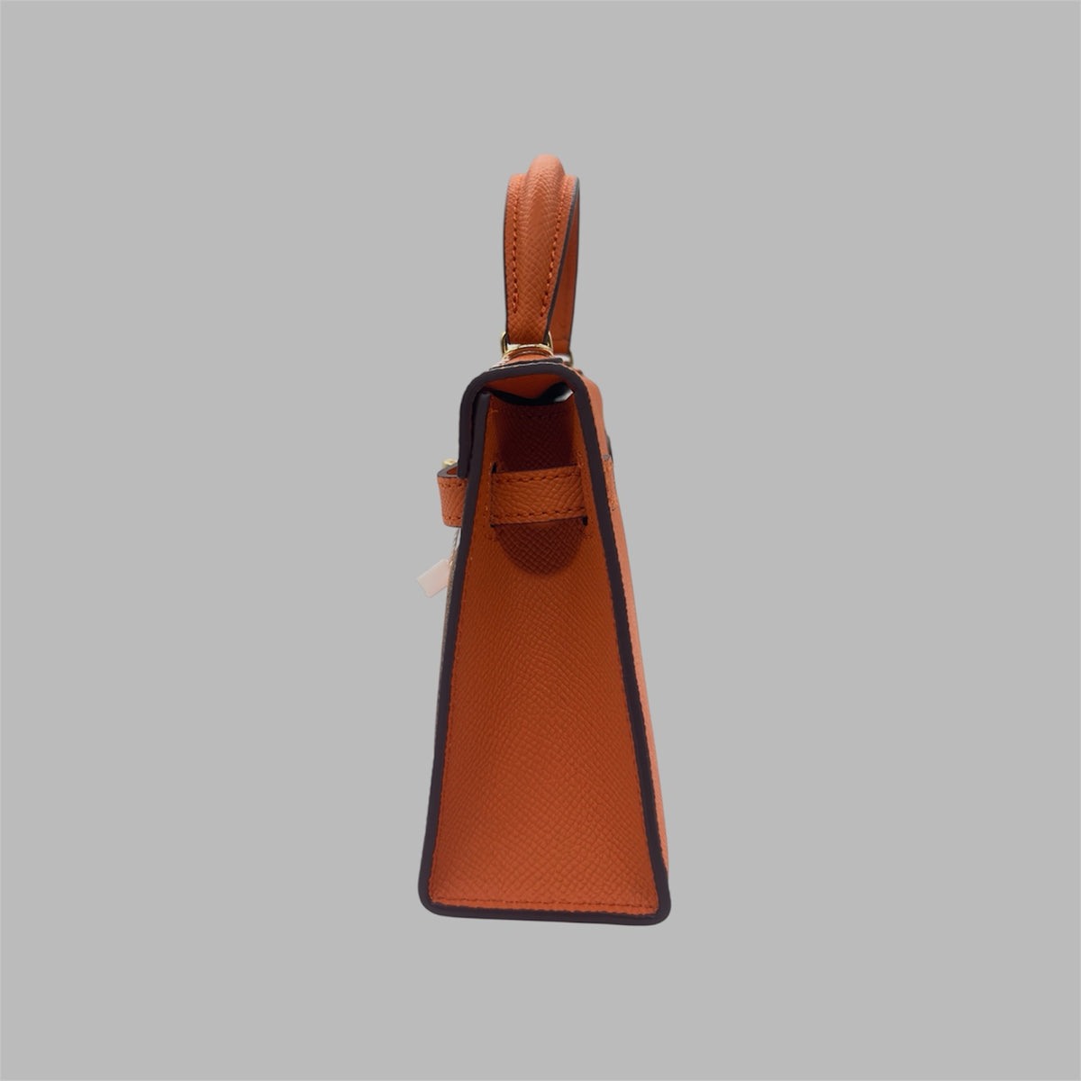 Hermès Kelly 25 retourne handbag strap in Orange Feu Togo leather , GHW